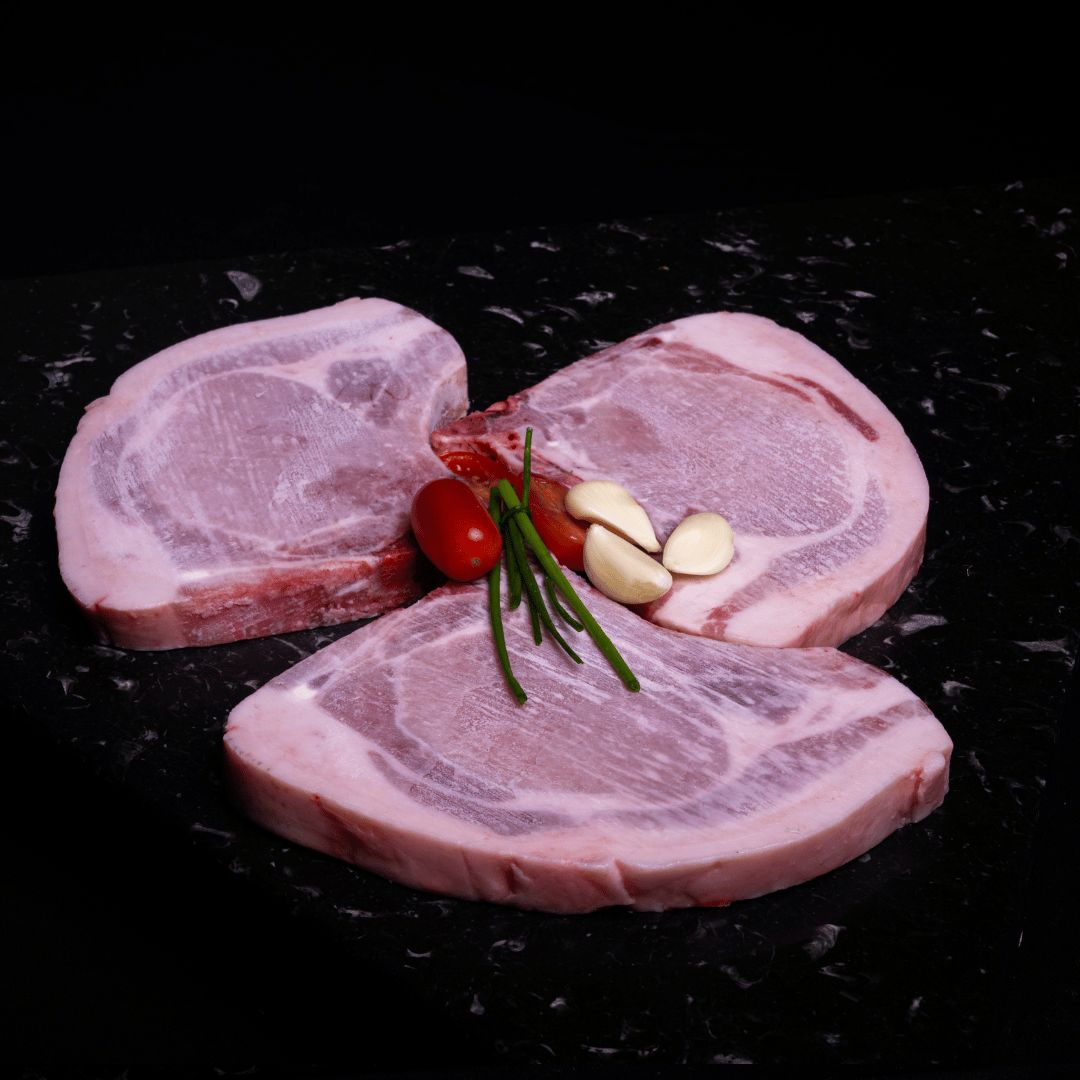 Chuleta dorsal de Cerdo con piel PORCINUS. Precio x kilo $36.000